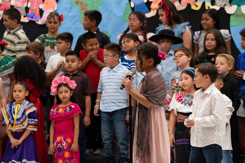 Students celebrate their diverse cultures and backgrounds during Bologna Elementary School's Celebration of Nations assembly.